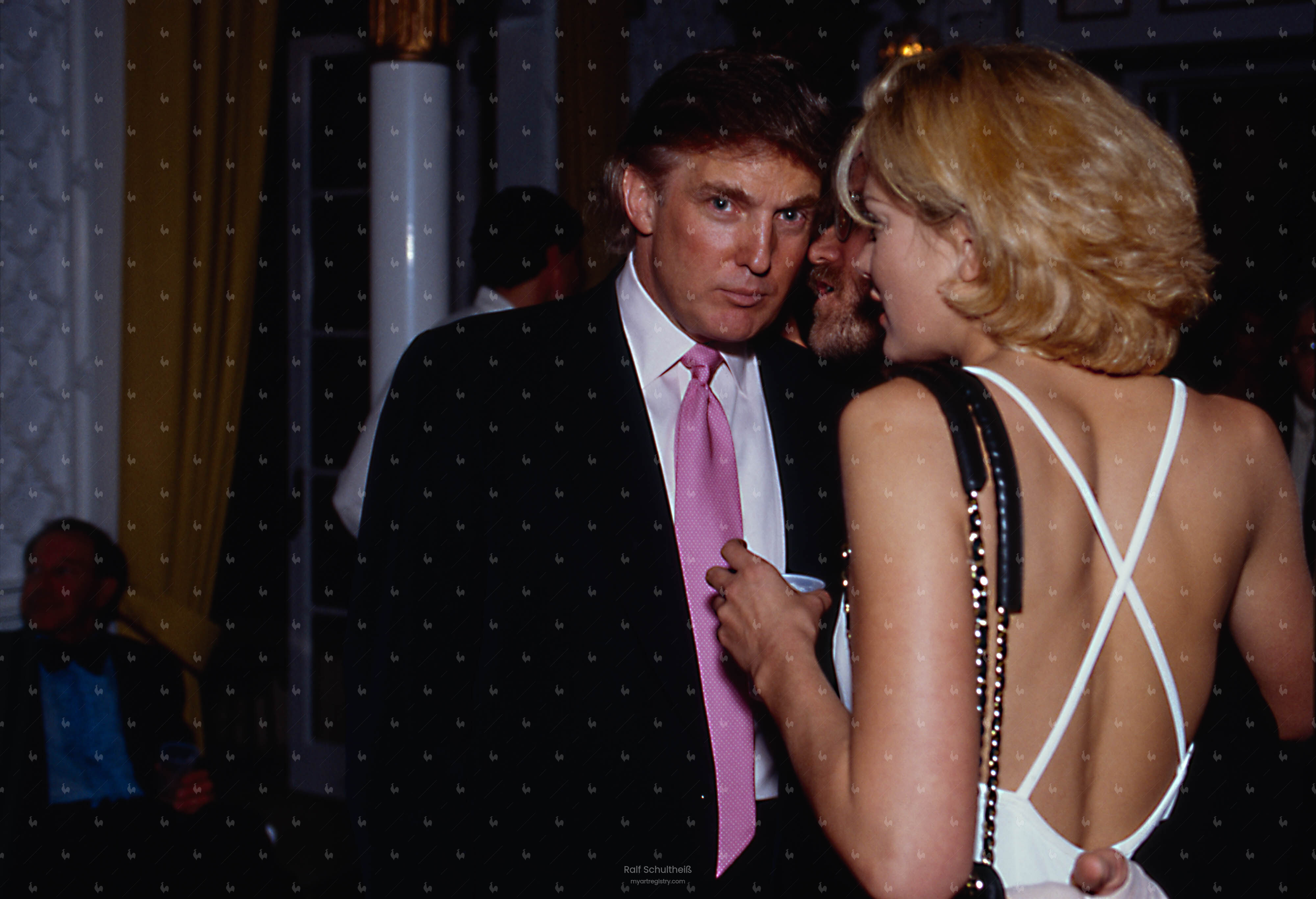 Donald Trump in conversation at his party 