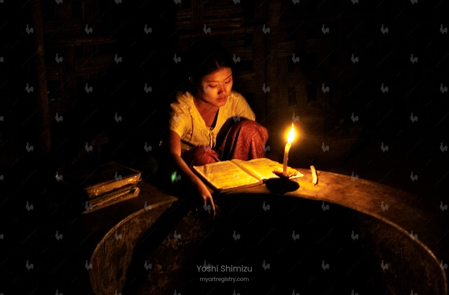 A Girl Studying with Candlelight - Myanmar - 2005