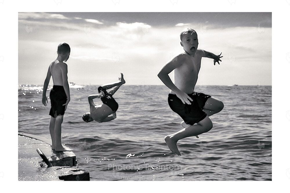 Boys Jumping off the Pier