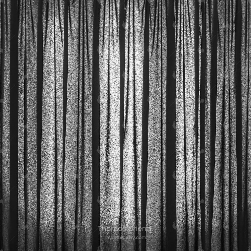 Behind the Curtain